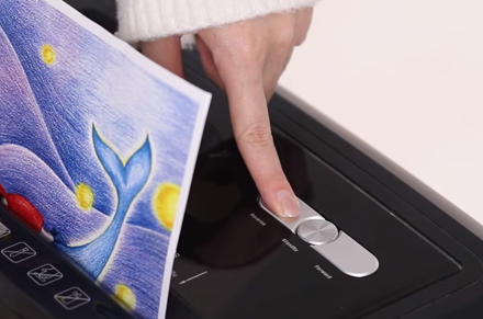 Máy hủy giấy Deli e14400